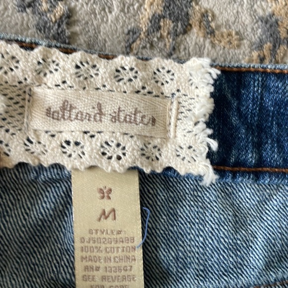 Altar’d State jean skirt with holes and frayed hem. Medium - Picture 3 of 3